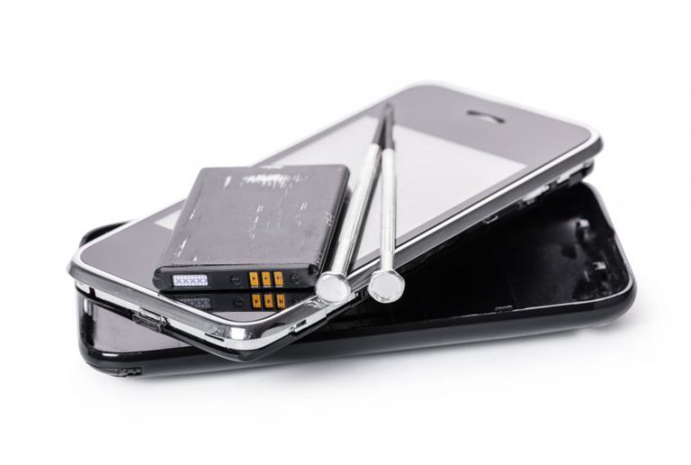 disassembled mobile phone and tools